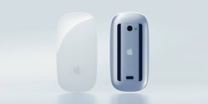 Vorder- und Rückseite einer Apple Mouse vor hellem Hintergrund