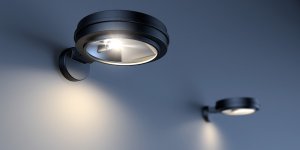 Rendering von zwei schwarzen Wandleuchten mit Lichtschein